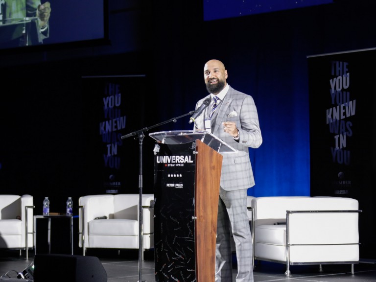 Person speaking on stage