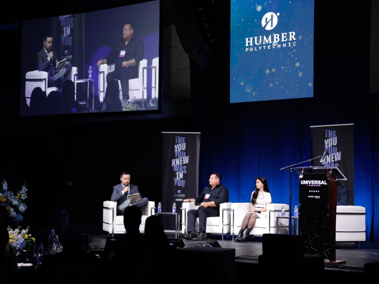 People talking on stage