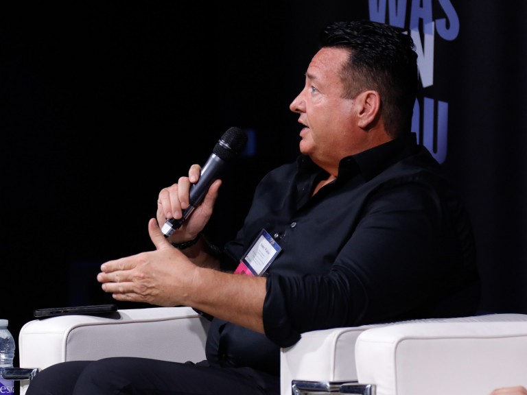 Person talking on microphone