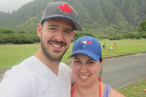 Berrit and Andrew together wearing Toronto Blue Jay Caps