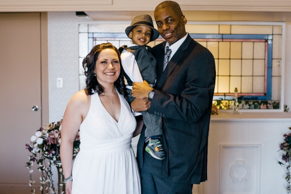 Hentely and Christine on their wedding day with their son