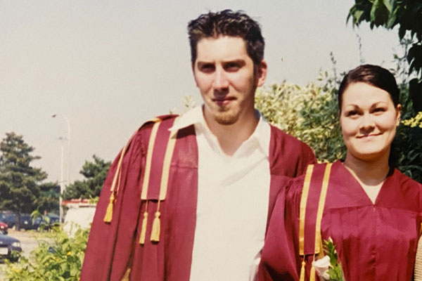 Lisa and Hugh in graduation gowns