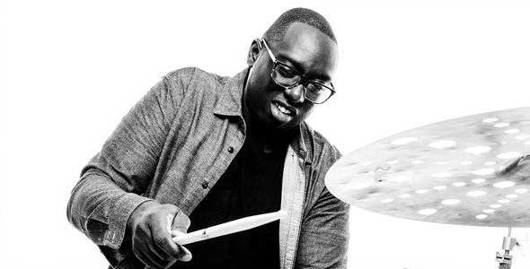 Larnell Lewis on the drums