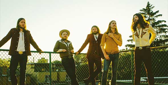 The Sheepdogs band members standing outdoors