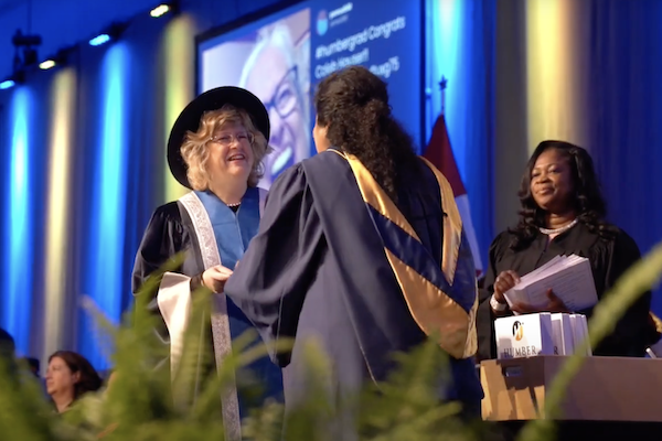 president congratulating humber graduate