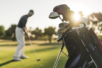 golfer and bag