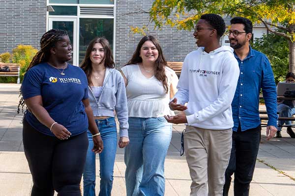 Group of people walking on Humber campus tour