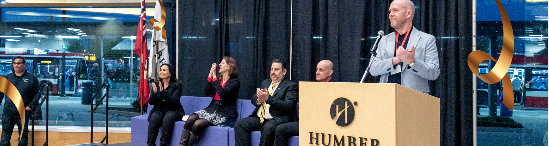 People applauding on stage