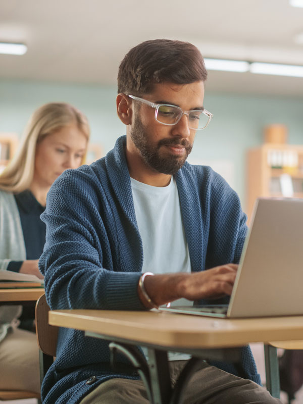 Student looking at laptop screen