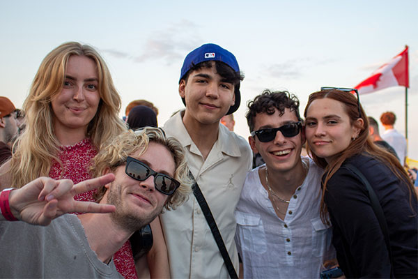 Group of students standing together smiling