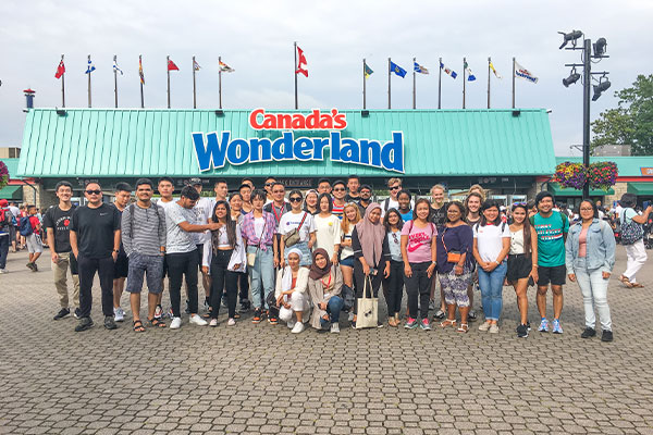 Large group of students in front of the Canada's Wonderland entrance