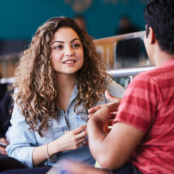 Two people talking