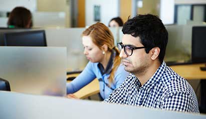 student working on computer