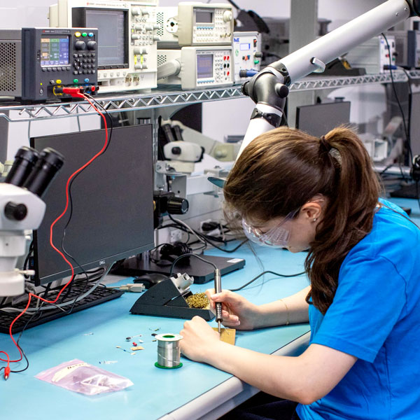 Student working with soldering iron