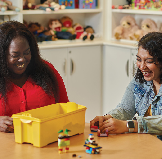 two students in the play lab