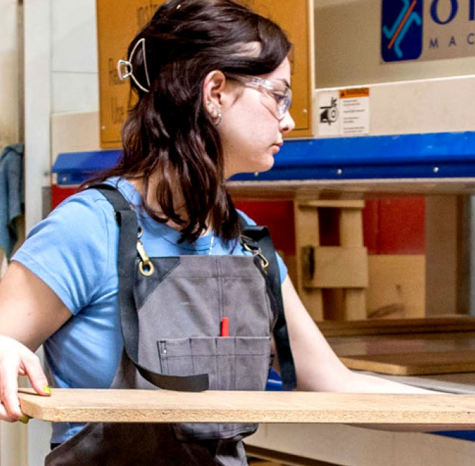 student in the wood working lab