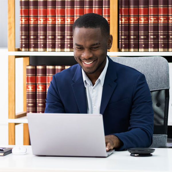 person typing on a laptop