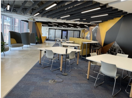 Learning commons room. Professional atmosphere, designed with a clean, contemporary aesthetic