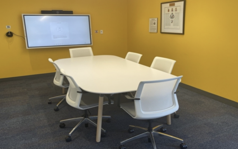 Small Meeting Room with table, chairs and screen