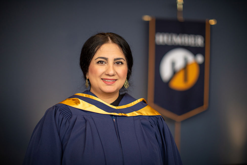 Grad posing for photo