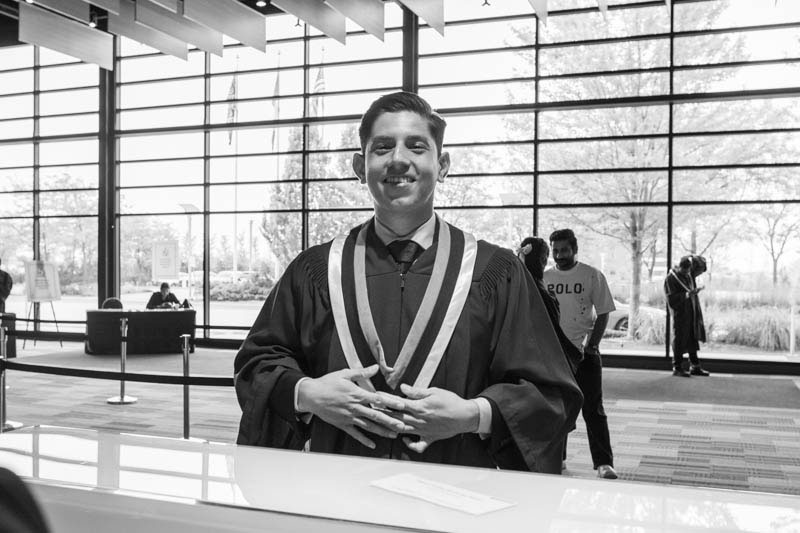 Graduate smiles