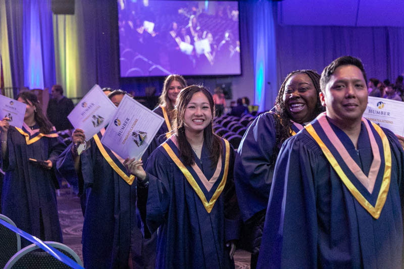 Graduates leave ceremony hall