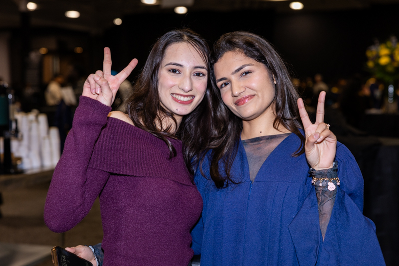 Two people posing for photo