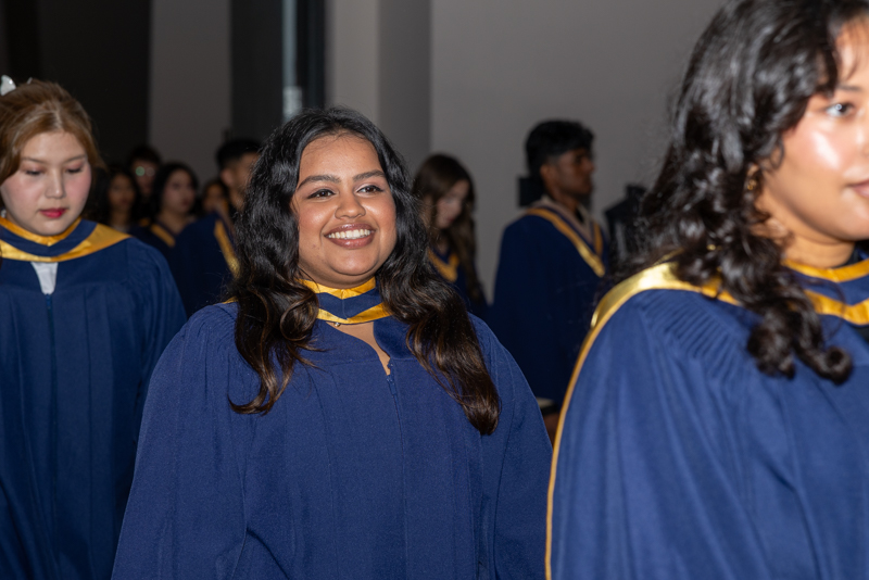 Students in line smiling
