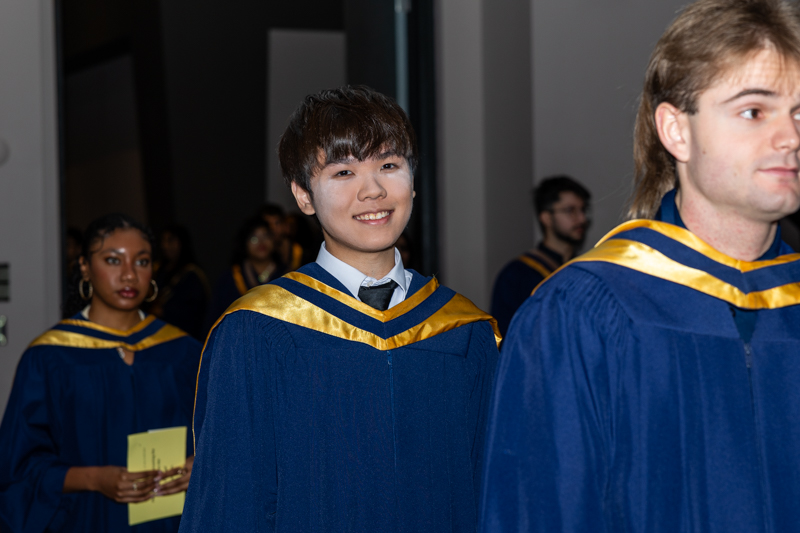 Students in line smiling
