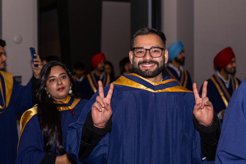 Students in line posing for photo