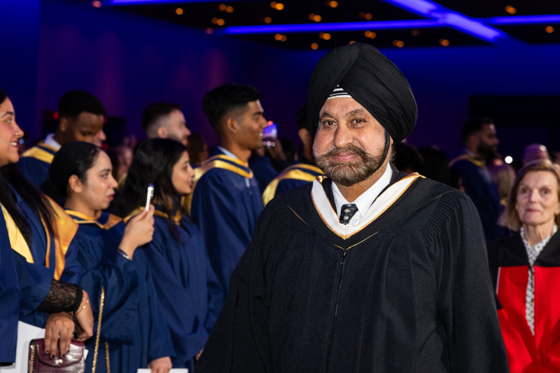 Person smiling in line