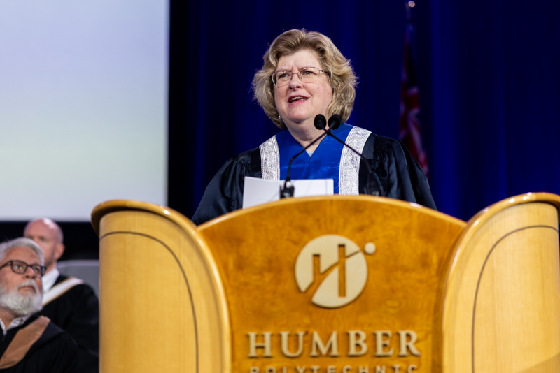 Humber president talking on podium