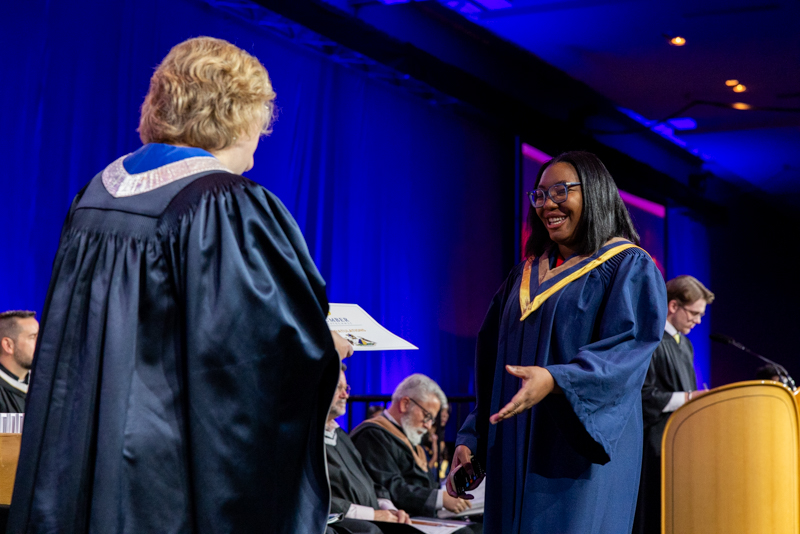 Student receiving diploma