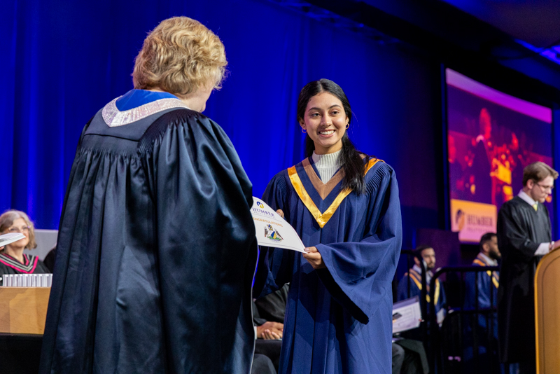 Student receiving diploma