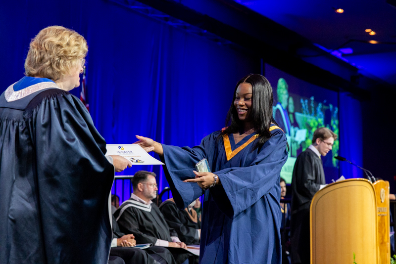 Student receiving diploma