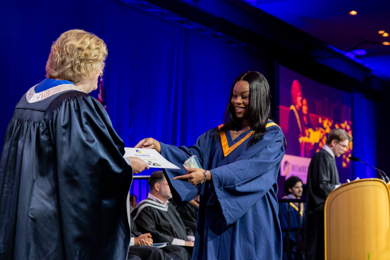 Student receiving diploma