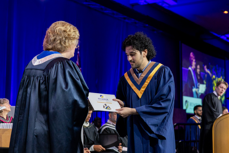 Student receiving diploma