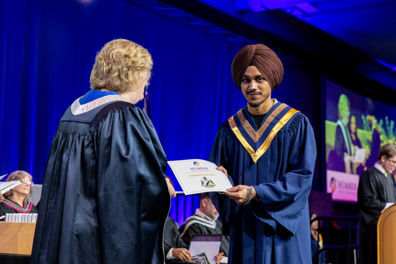 Student receiving diploma