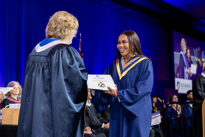 Student receiving diploma