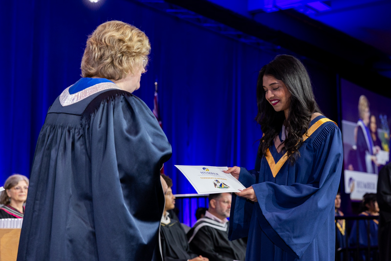 Student receiving diploma