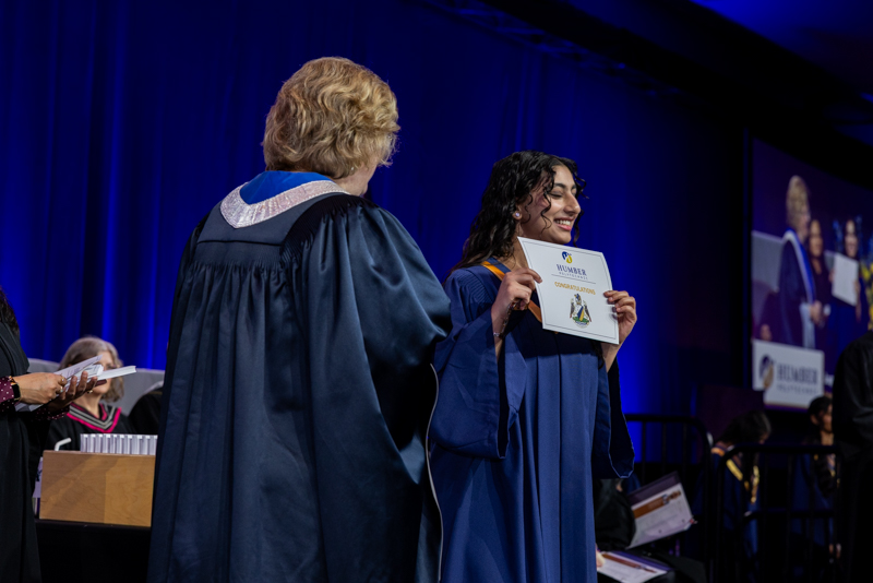 Student receiving diploma