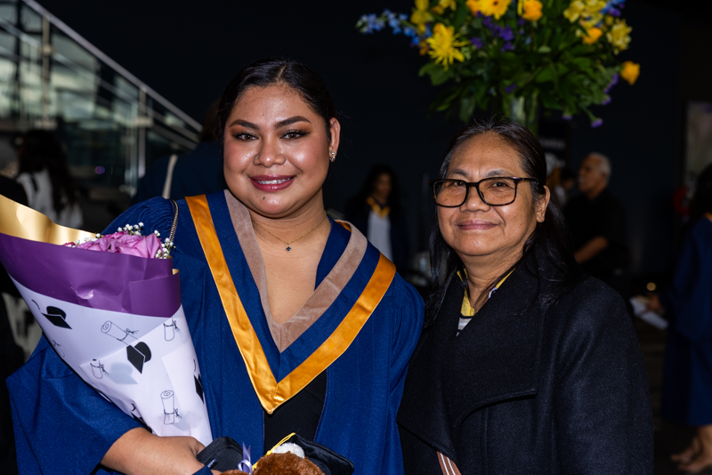 Two people posing for photo