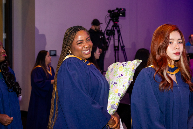 Students in line smiling