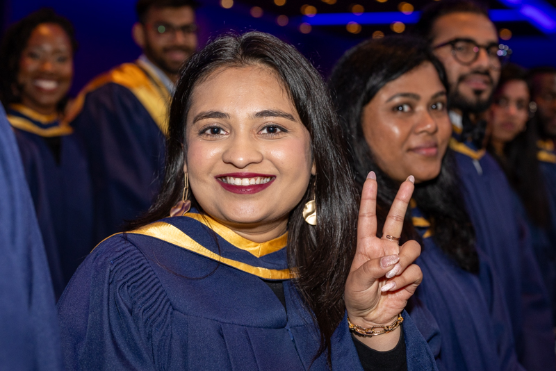 Student smiling for camera