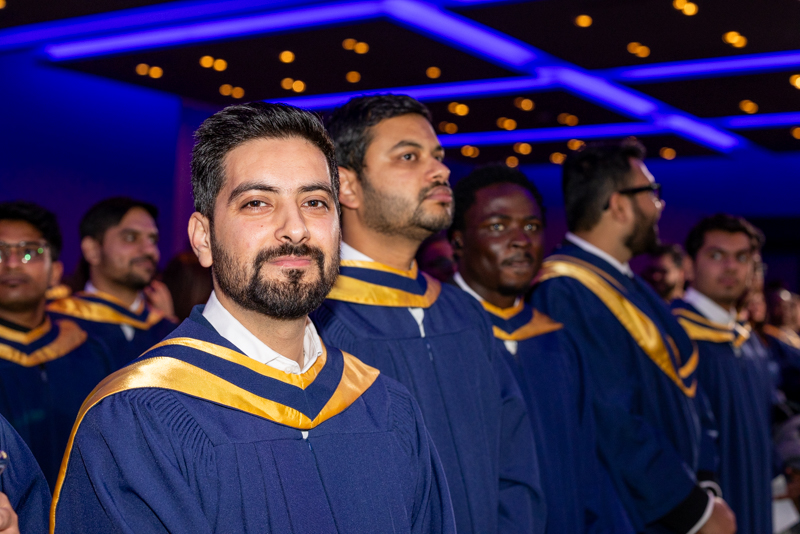 Student smiling for camera
