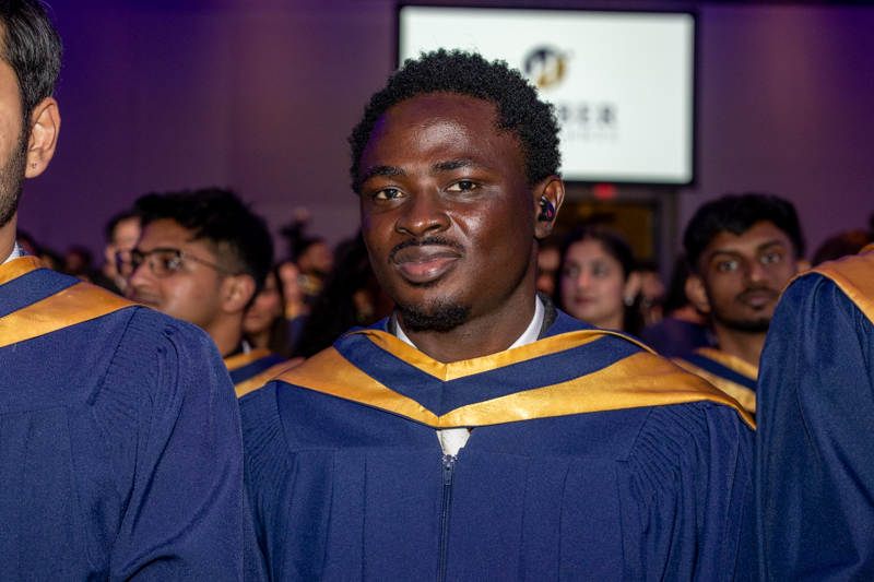 Student smiling for camera