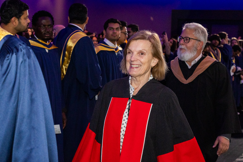 Humber staff walking the aisle