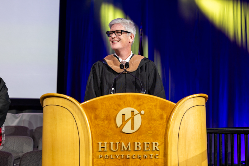 Humber Staff talking on podium