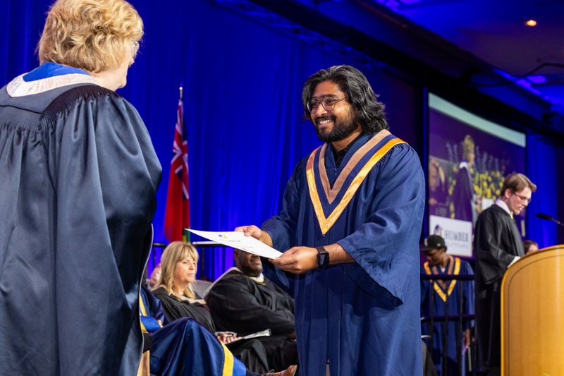 Student receiving diploma