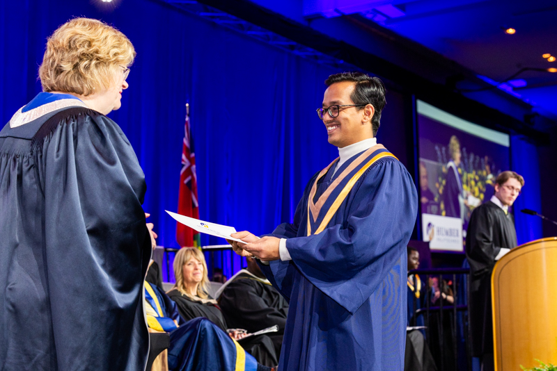 Student receiving diploma